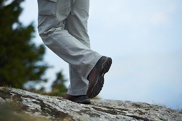 Image showing hiking man with trekking boots