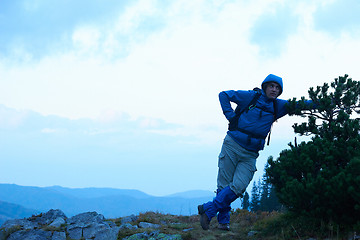 Image showing advanture man with backpack hiking