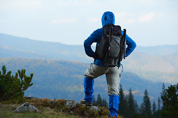 Image showing advanture man with backpack hiking