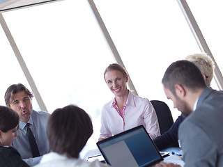 Image showing business people group on meeting at bright modern office