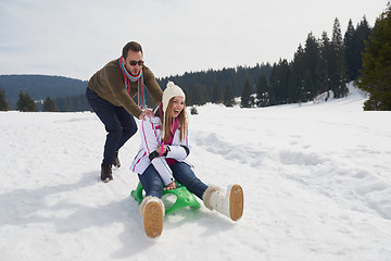 Image showing happy young couple having fun on fresh show on winter vacation