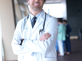 Image showing group of medical staff at hospital, doctor in front of team