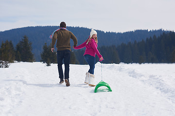 Image showing happy young couple having fun on fresh show on winter vacation