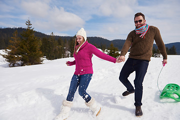 Image showing happy young couple having fun on fresh show on winter vacation