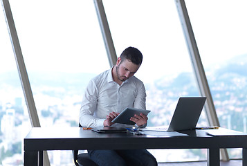 Image showing young business man at office