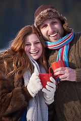 Image showing couple drink warm tea at winter