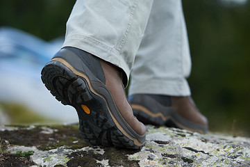 Image showing hiking man with trekking boots