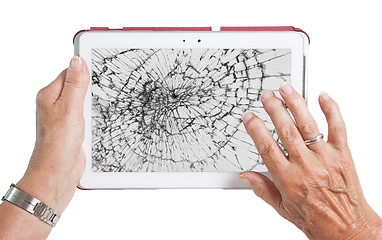 Image showing Senior lady with tablet, cracked screen