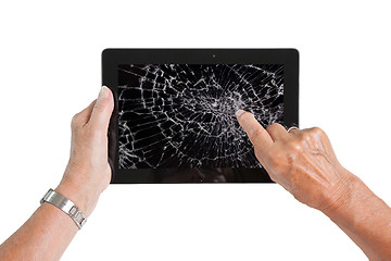 Image showing Senior lady with tablet, cracked screen