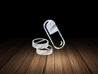 Image showing Healthcare concept: Pills in grunge dark room