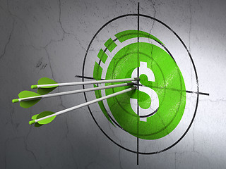 Image showing Money concept: arrows in Dollar Coin target on wall background