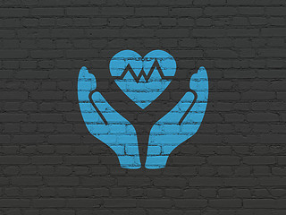 Image showing Insurance concept: Heart And Palm on wall background