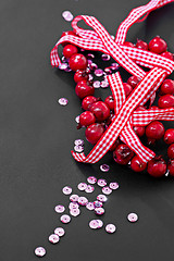 Image showing Christmas decoration and pink sequins