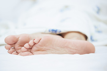 Image showing Feet of sleeping woman