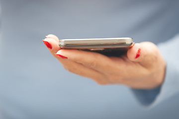 Image showing Woman with smartphone