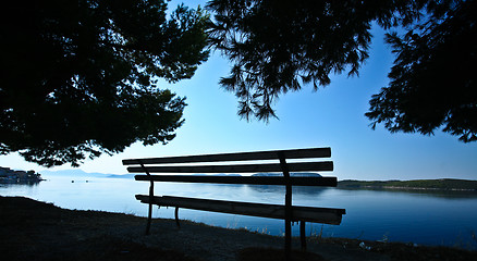 Image showing Trees and bench at the coast line in   Peloponese in Greece