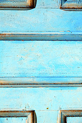 Image showing stripped paint in  blue wood door and  