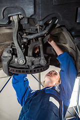 Image showing Mechanic Repairing Car In Automobile Shop