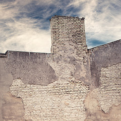 Image showing abandoned grunge cracked brick stucco wall