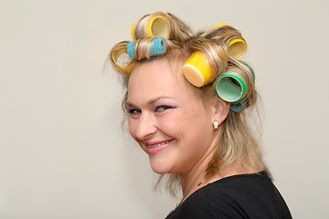 Image showing Woman with curler