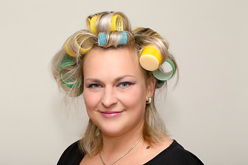 Image showing Woman with curler