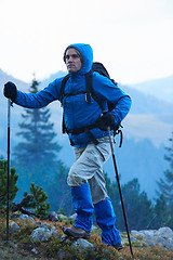 Image showing advanture man with backpack hiking