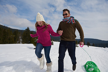 Image showing happy young couple having fun on fresh show on winter vacation