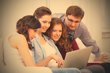 Image showing students and a notebook