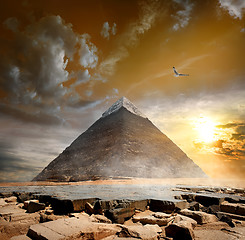 Image showing Pyramid under clouds