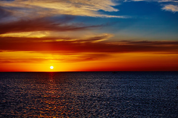 Image showing Sunset over the ocean