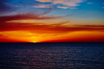 Image showing Sunset over the ocean