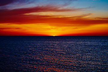 Image showing Sunset over the ocean