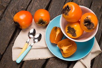 Image showing Orange persimmons