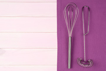 Image showing Kitchenware on purple towel