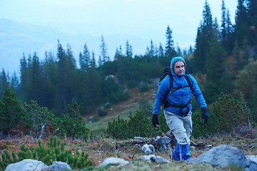 Image showing advanture man with backpack hiking