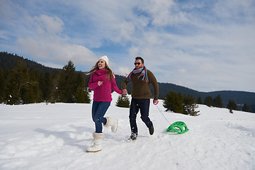 Image showing happy young couple having fun on fresh show on winter vacation