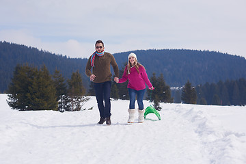 Image showing happy young couple having fun on fresh show on winter vacation