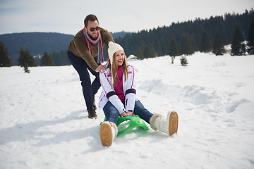 Image showing happy young couple having fun on fresh show on winter vacation