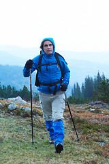 Image showing advanture man with backpack hiking