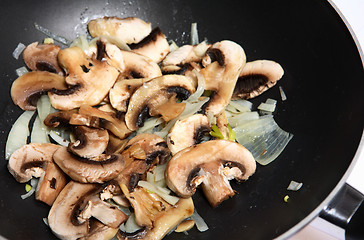 Image showing Mushroom onion stir-fry in wok