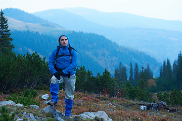 Image showing advanture man with backpack hiking