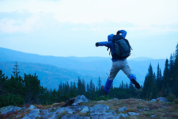 Image showing advanture man with backpack hiking