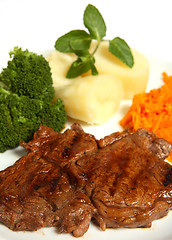 Image showing Grilled beef ribeye steak with vegetables meal