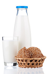 Image showing Milk with oat cookies