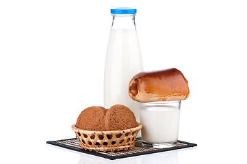 Image showing Milk with oat cookies and bun