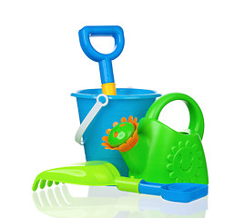 Image showing Toy bucket, rake and spade