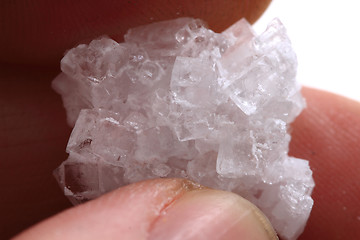 Image showing salt crystal in human hand