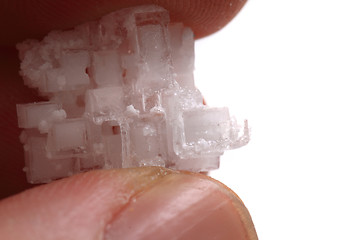 Image showing salt crystal in human hand