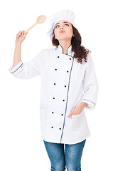 Image showing Woman chef with wooden spoon