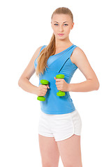 Image showing Sporty girl holding weights